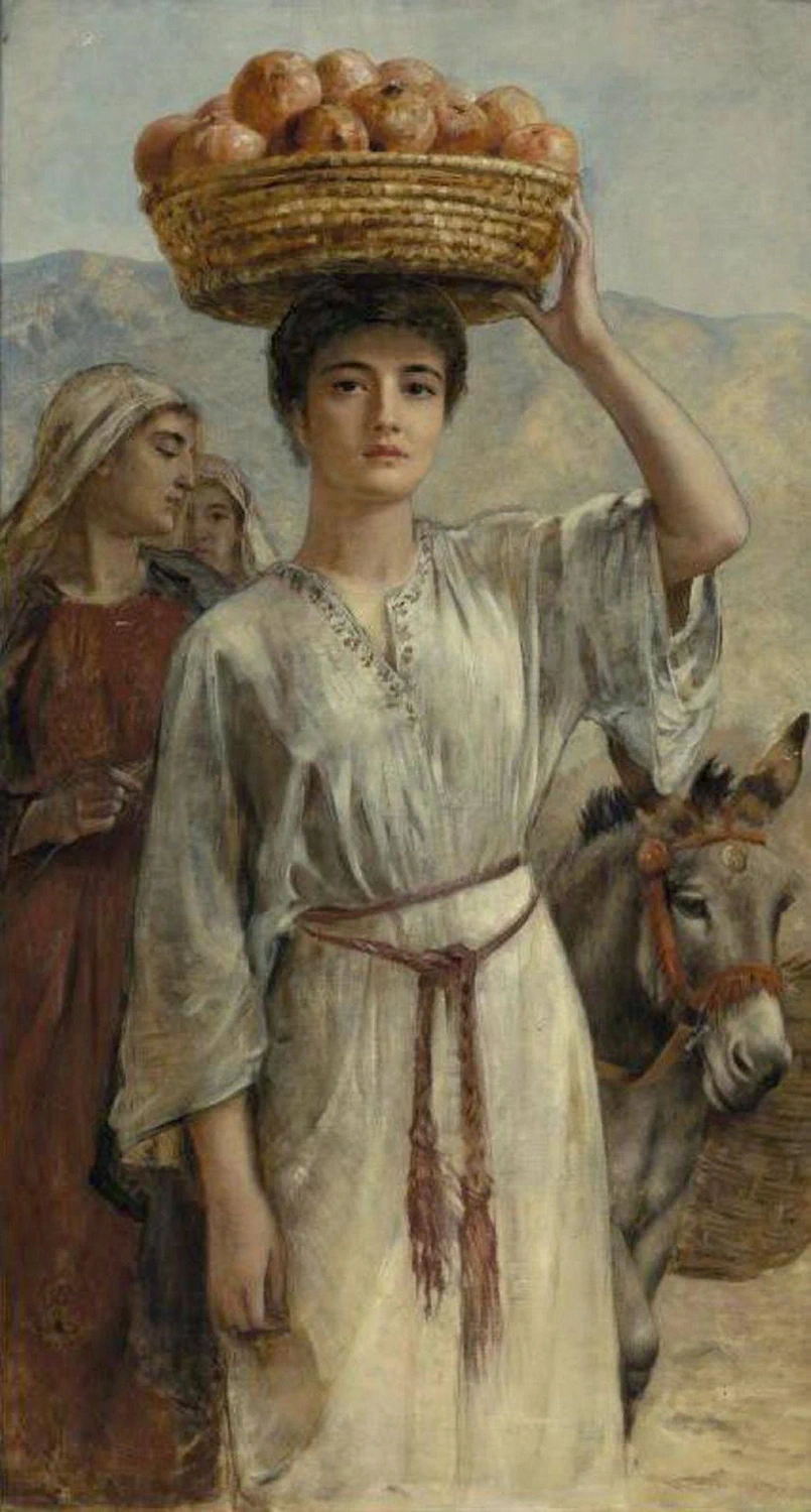 Donna che porta un cesto pieno di melograni